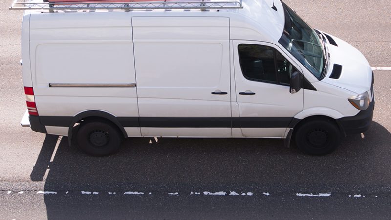 A van photographed on a freeway.