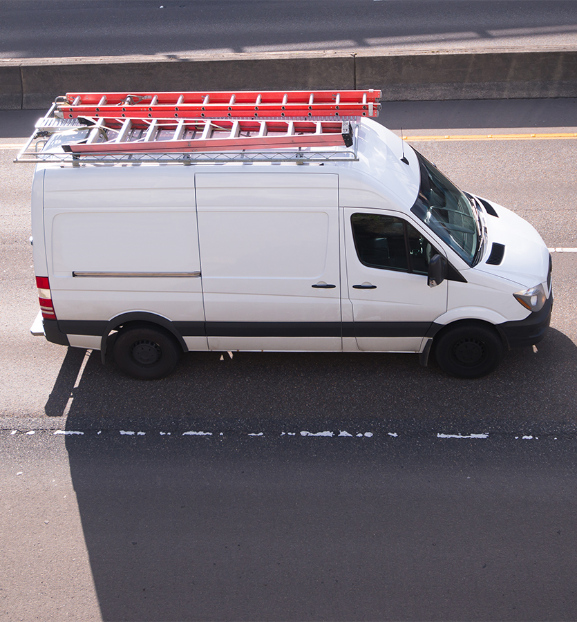 A van photographed on a freeway.