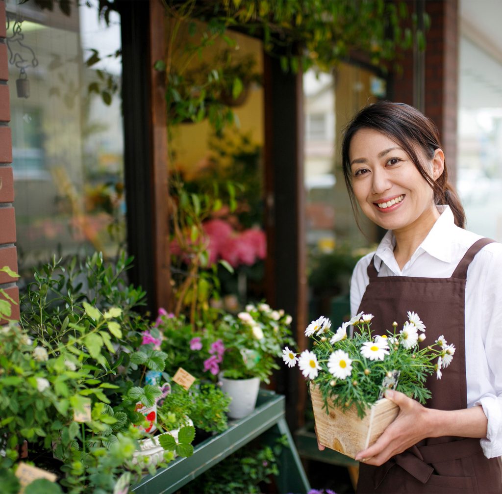 A small business owner photographed outside her business.