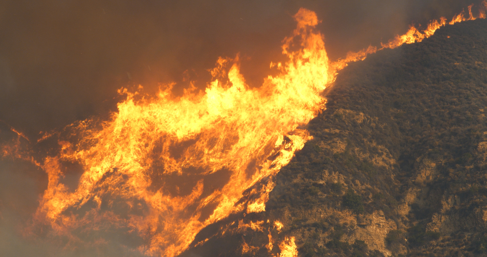 The Woolsey Fire burns in Malibu.